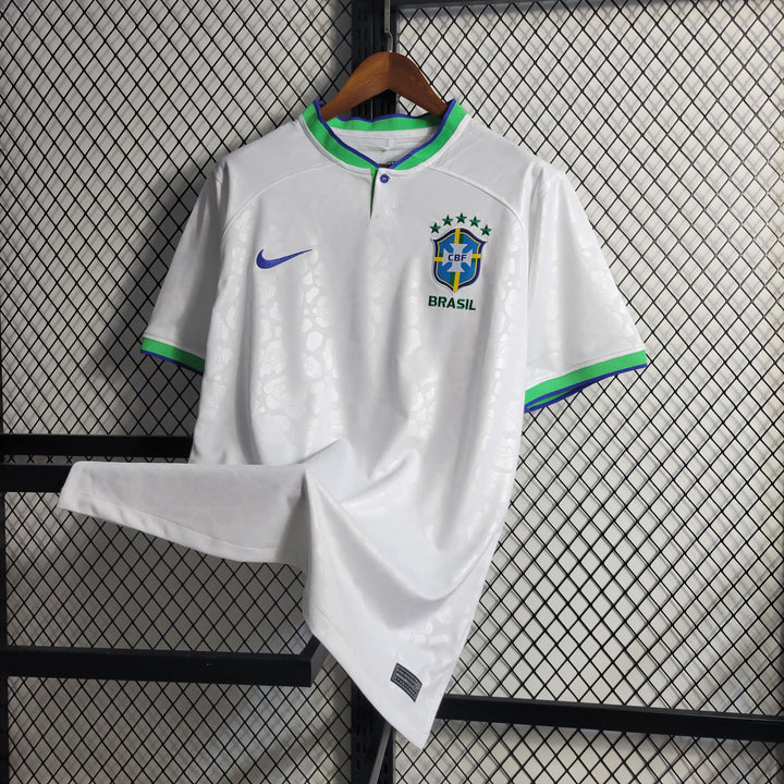 Camisa Nike Brasil 2022/23 Torcedor Masculina Branca Gola Verde Estampa Onça Pintada