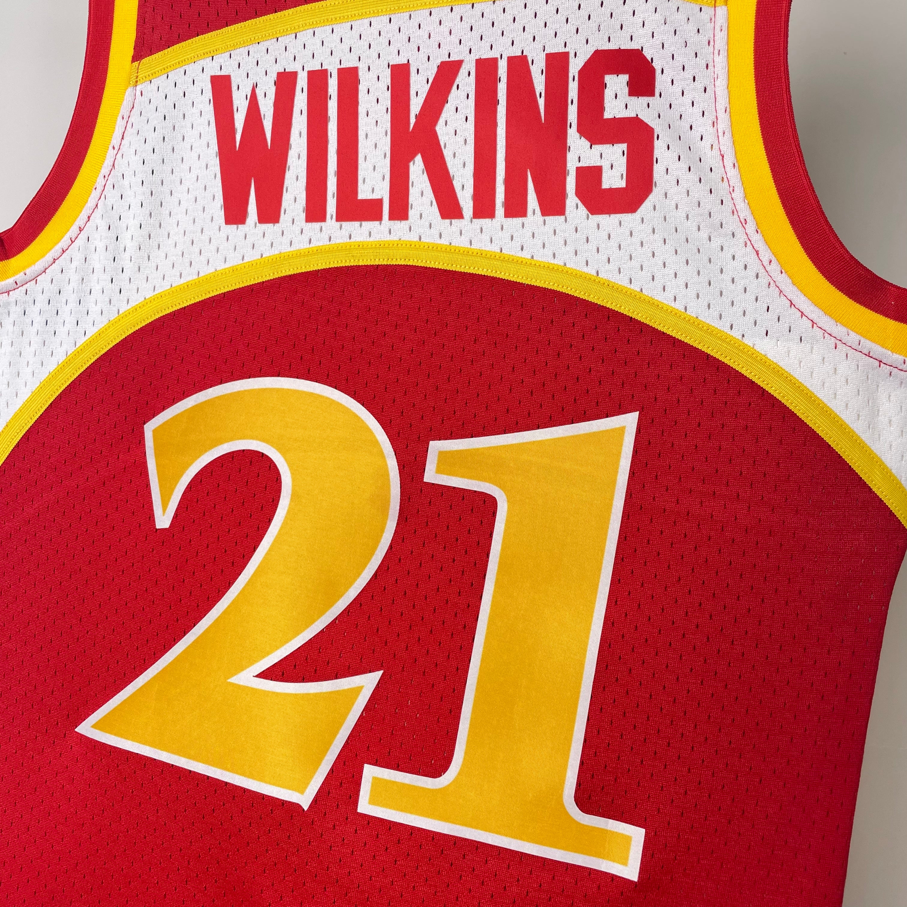 Camisa masculina Mitchell & Ness Dominique Wilkins Red Atlanta Hawks 1986-87 Hardwood Classics Swingman