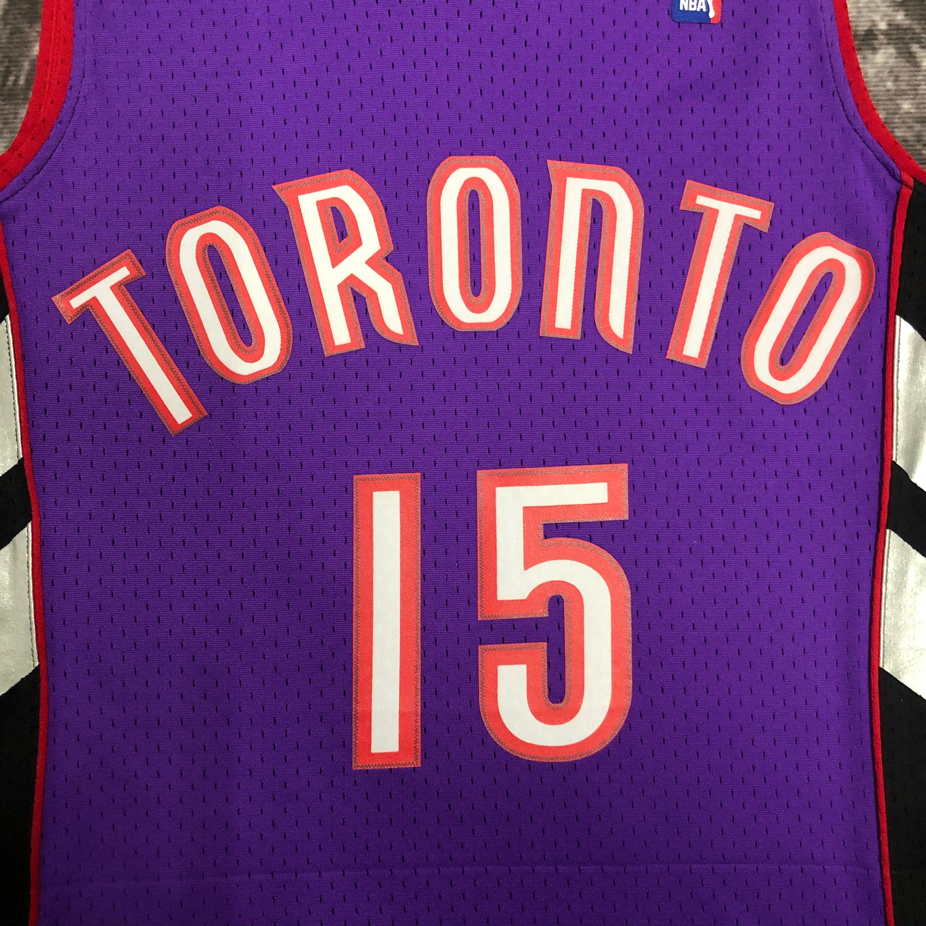Camisa masculina Toronto Raptors Vince Carter Mitchell & Ness roxa 1999/00 Hardwood Classics Swingman