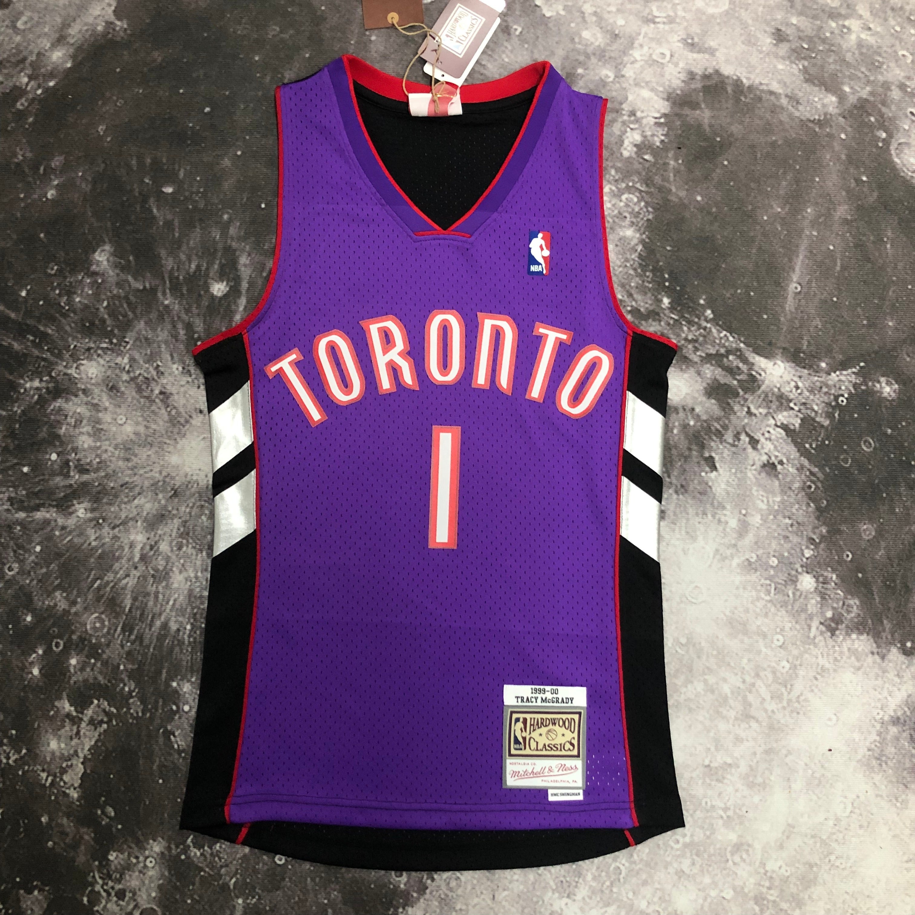Camisa masculina Toronto Raptors Tracy McGrady Mitchell & Ness roxa 1999/00 Hardwood Classics Swingman