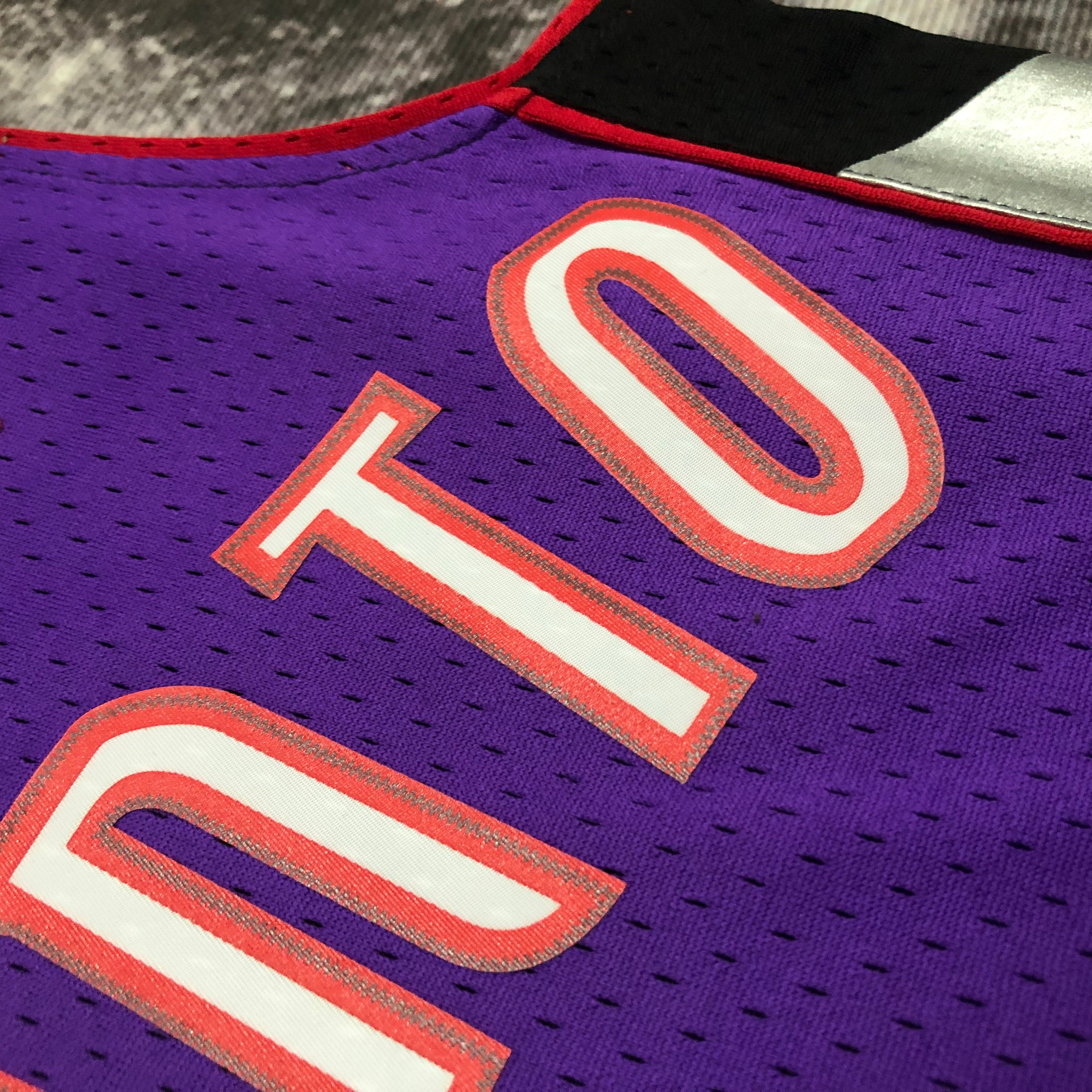 Camisa masculina Toronto Raptors Tracy McGrady Mitchell & Ness roxa 1999/00 Hardwood Classics Swingman