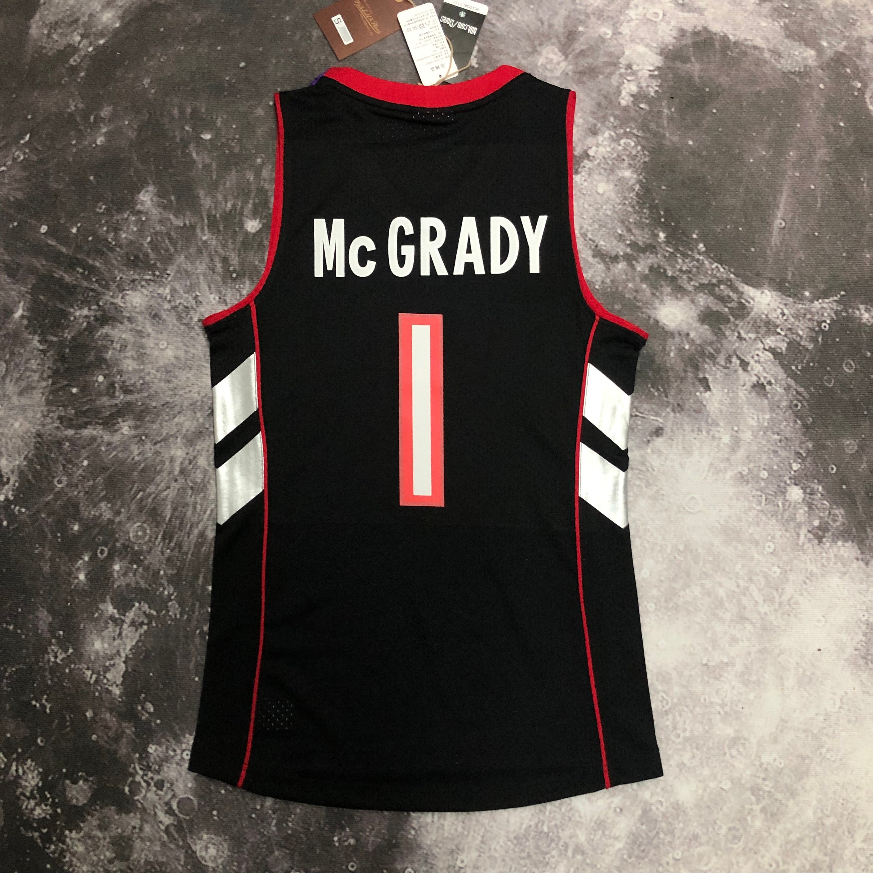 Camisa masculina Toronto Raptors Tracy McGrady Mitchell & Ness roxa 1999/00 Hardwood Classics Swingman