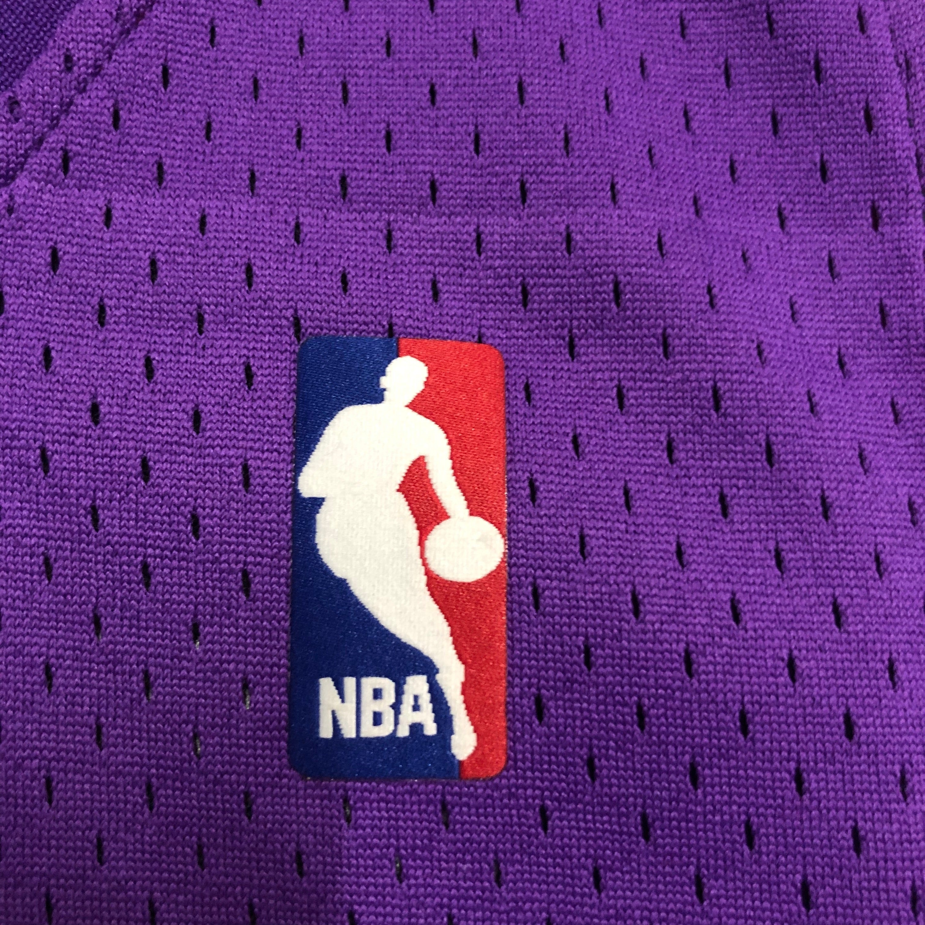 Camisa masculina Toronto Raptors Tracy McGrady Mitchell & Ness roxa 1999/00 Hardwood Classics Swingman