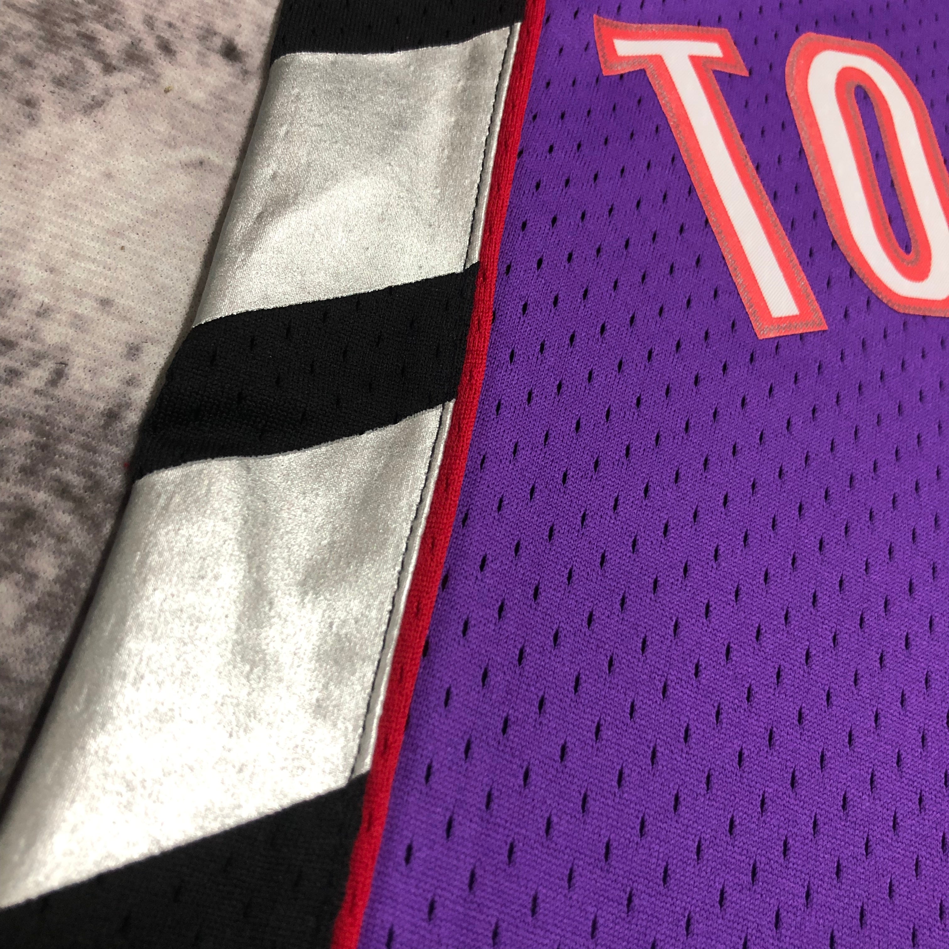 Camisa masculina Toronto Raptors Tracy McGrady Mitchell & Ness roxa 1999/00 Hardwood Classics Swingman