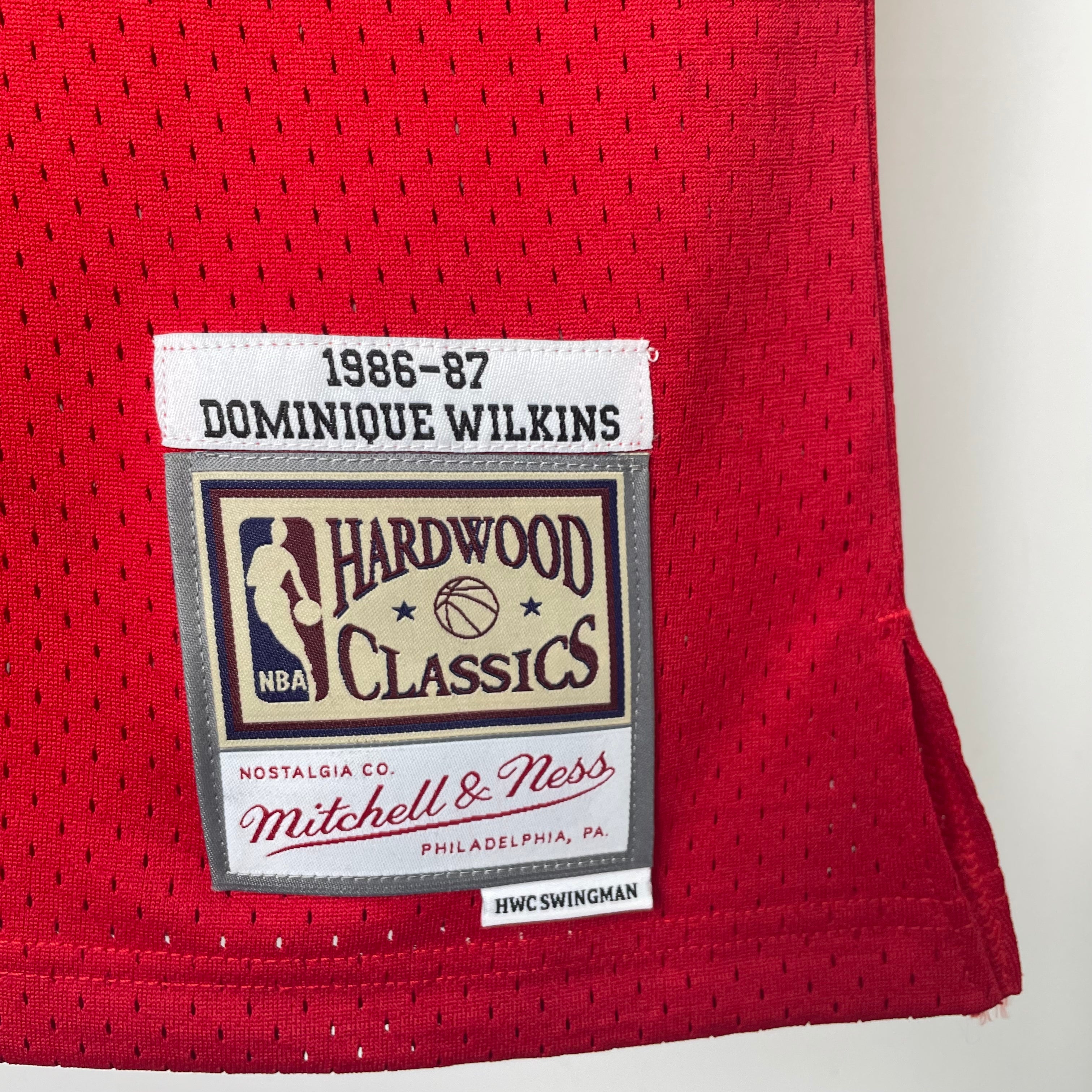 Camisa masculina Mitchell & Ness Dominique Wilkins Red Atlanta Hawks 1986-87 Hardwood Classics Swingman