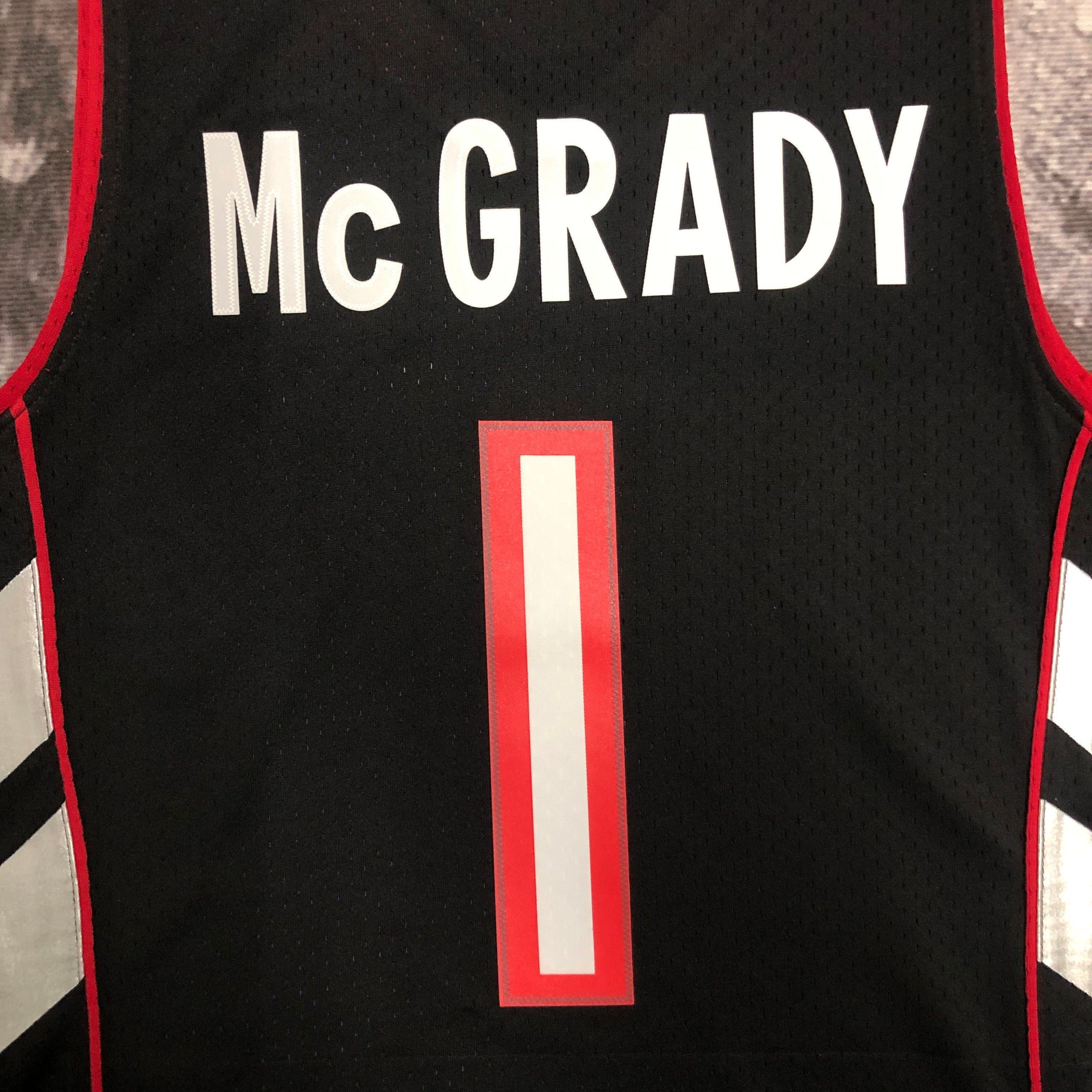 Camisa masculina Toronto Raptors Tracy McGrady Mitchell & Ness roxa 1999/00 Hardwood Classics Swingman